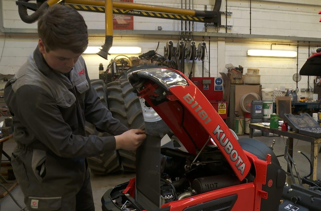 Technician carrying out maintenance