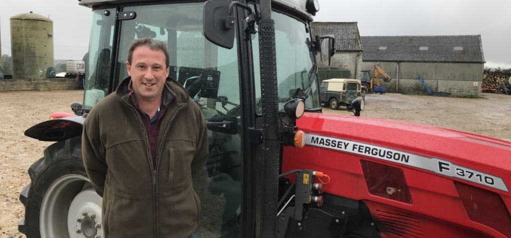 David Pike in front of a tractor