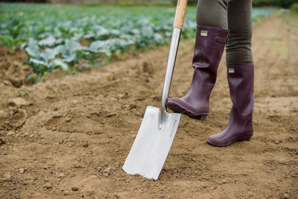 Close up of man using a Stainless Steel Digging Spade