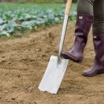 Close up of man using a Stainless Steel Digging Spade