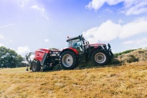 Massey Ferguson 6S tractor baling