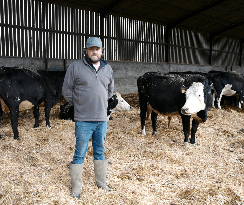 Farmer Nick Lee with his livestock