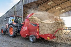 Kverneland bale chopper feeder on a farm