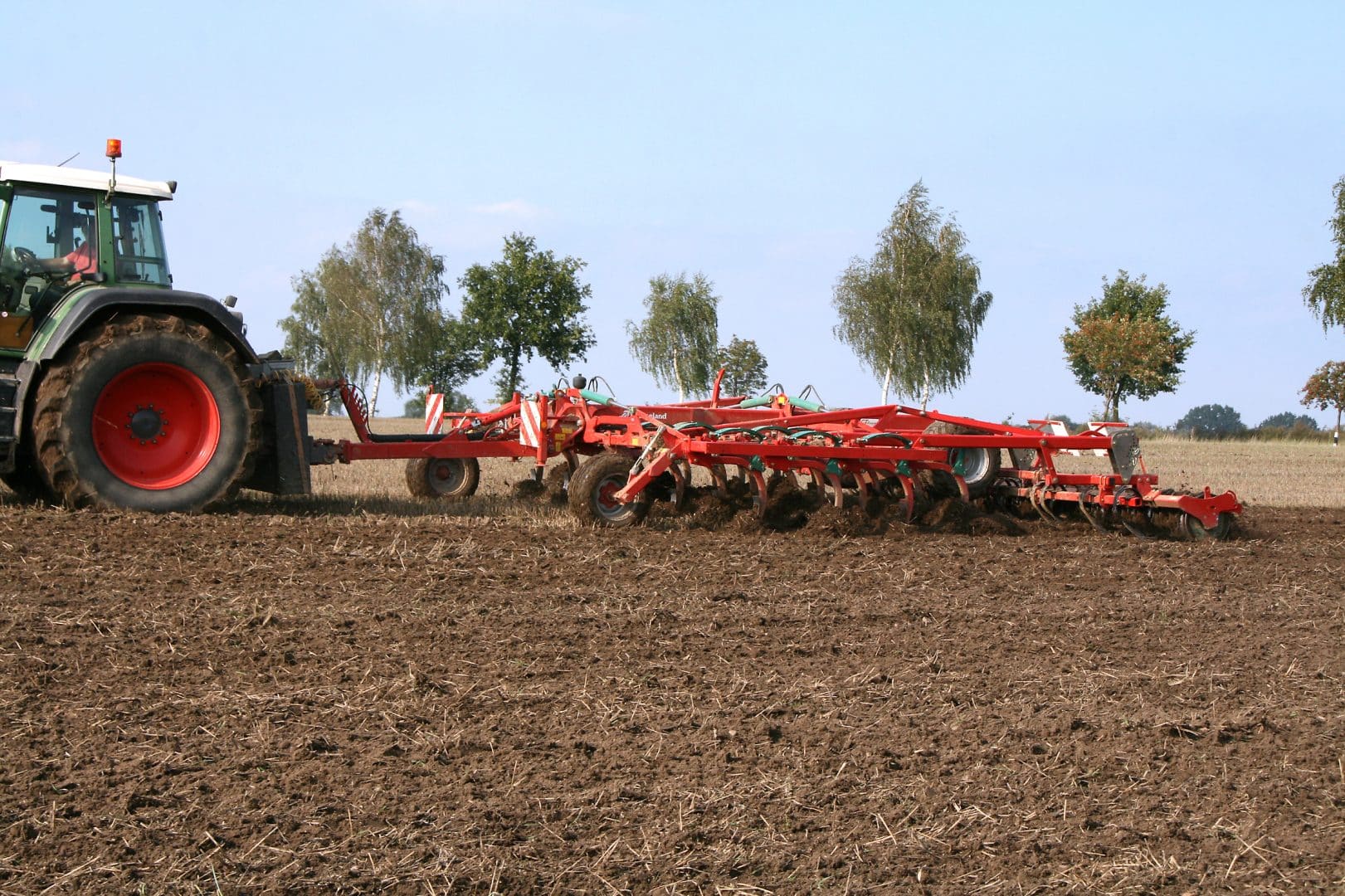 Kverneland cultivator in a field