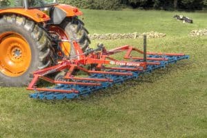 OPICO grass harrow in a field