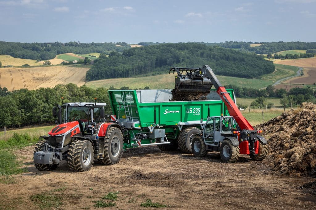 Massey Ferguson 9S tractor and telehandler on a farm