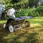 Stihl MF-MM Dethatcher Multitool in use
