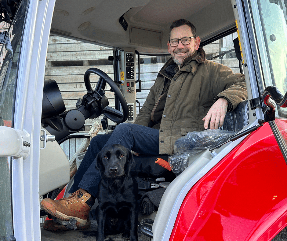 Farmer, Daniel Scott with his dog, Ruby and the new Massey Ferguson 7S.180 Dyna-6 Eco.