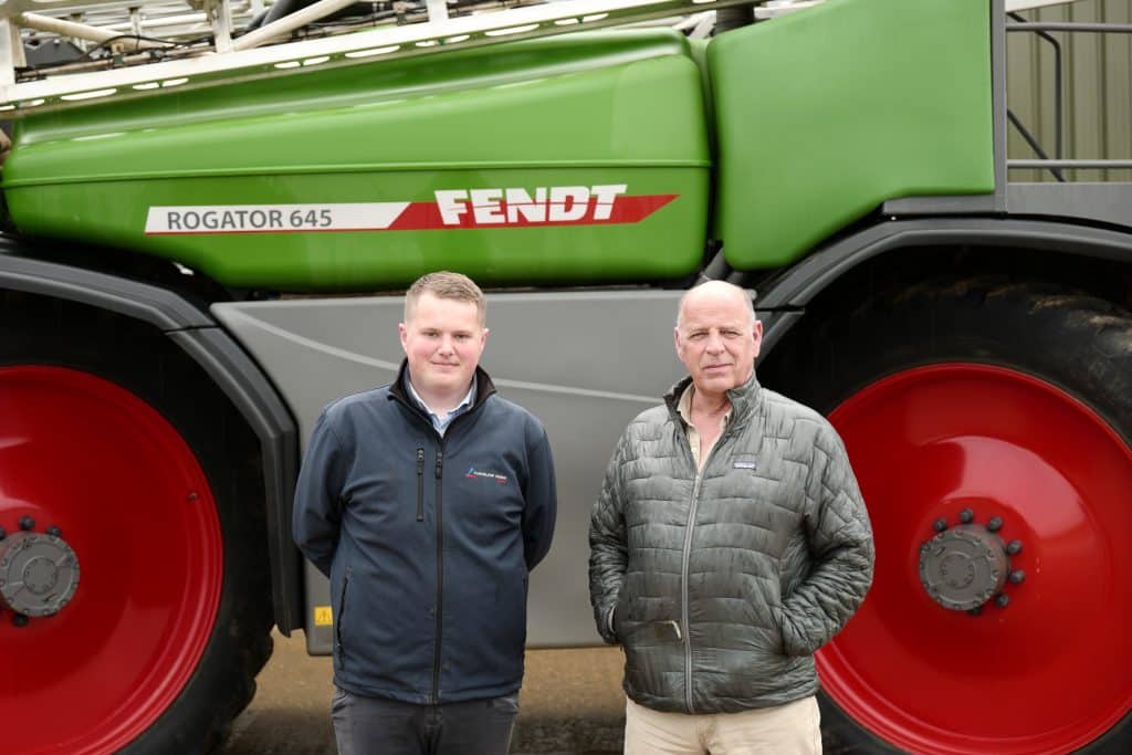 Pictured with the Rogator 645 sprayer: Thurlow Nunn Standen Area Sales Manager, Josh Taylor with farmer, Mark Coe.