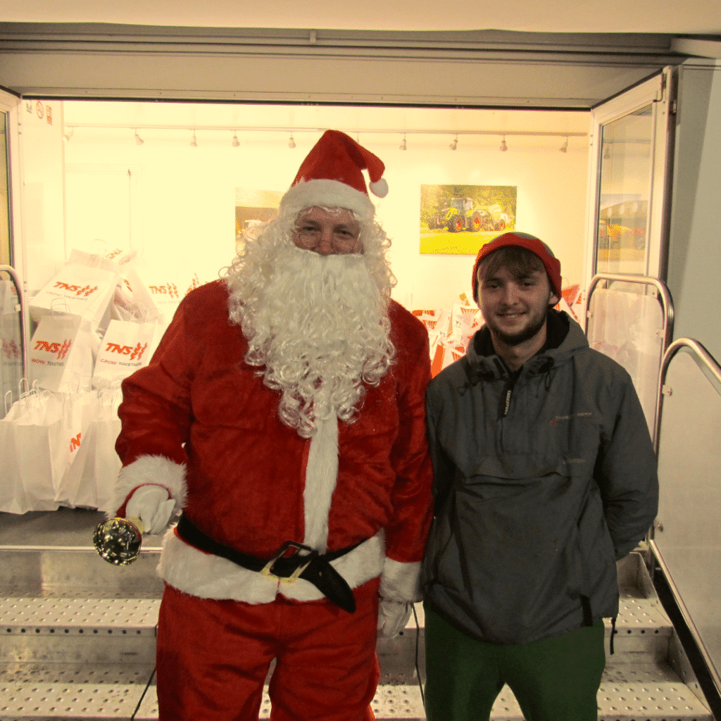 Santa and Elf at TNS Christmas Lights Event