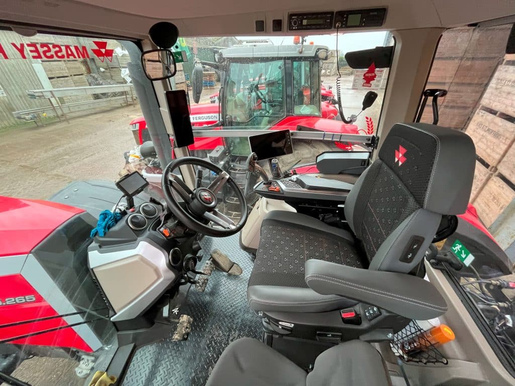 Massey ferguson 8S spacious cab providing better visibility and additional comfort on the road.