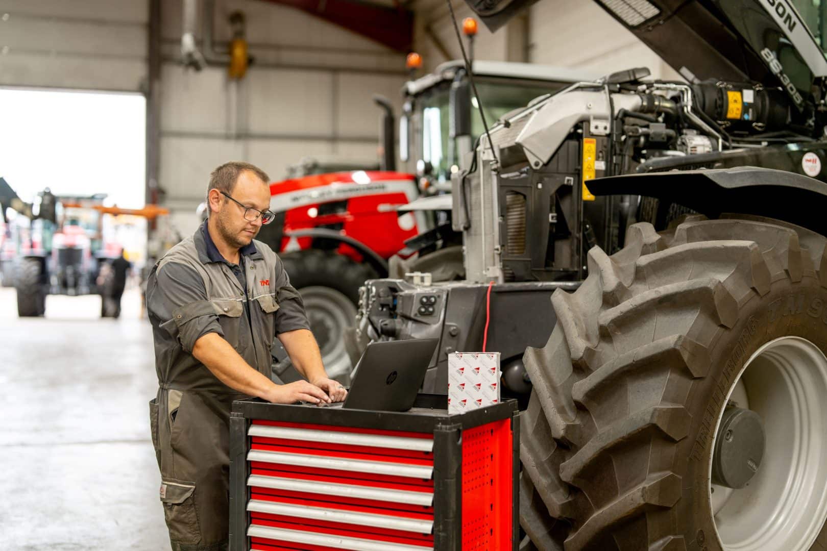 TNS technician Gareth repairing a tractor